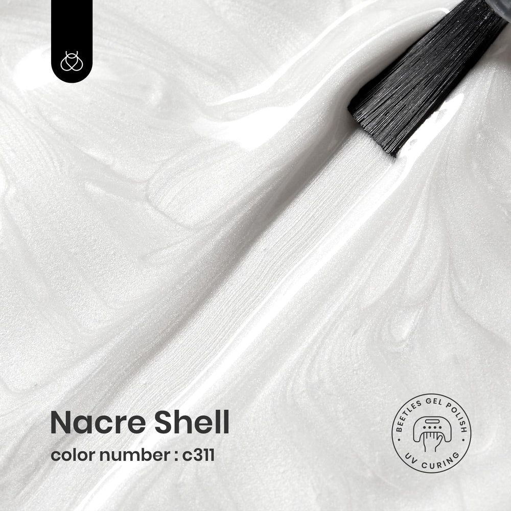 beetles pearl white brush stroke on palette showing smooth coverage and easy application