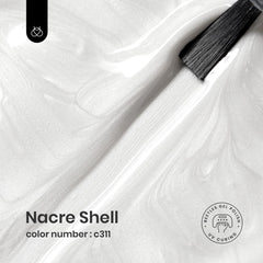 beetles pearl white brush stroke on palette showing smooth coverage and easy application