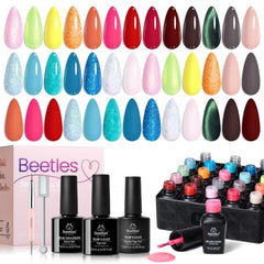 beetles bottles beside a hand for size comparison, communicates compact 5ml and 7.5ml volumes