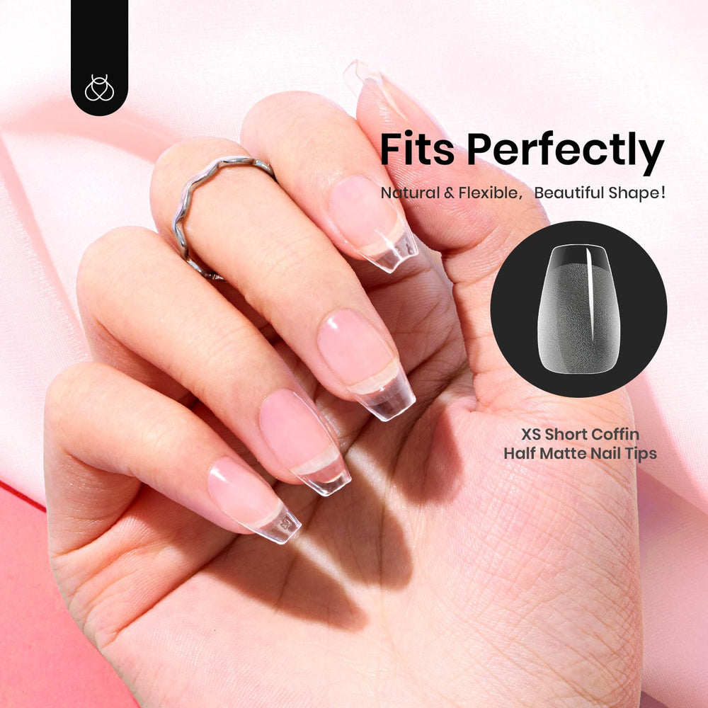 Beetles finished short coffin manicure in a lifestyle setting highlighting polished look