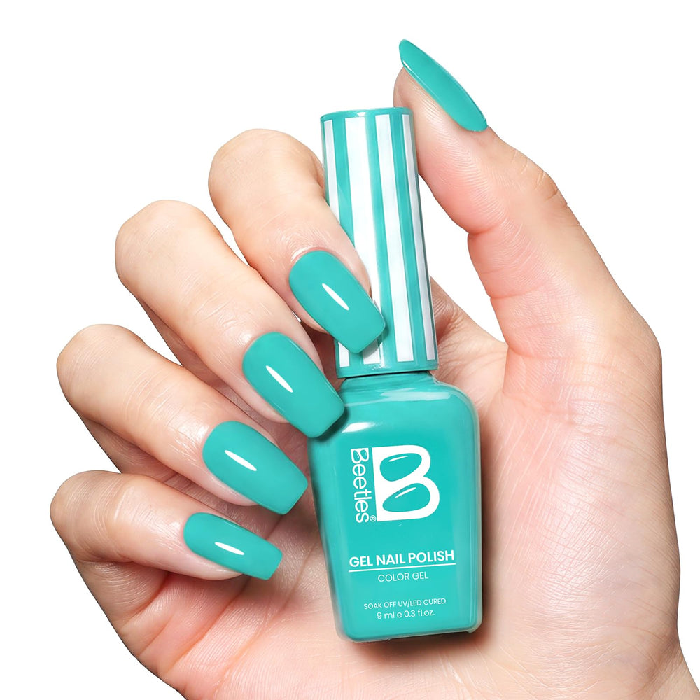 Beetles teal on nails in holiday scene conveying vibrant summer mood and style
