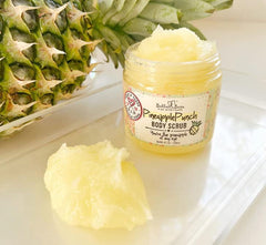 Bella and Bear hand scooping scrub demonstrating easy application and smooth skin