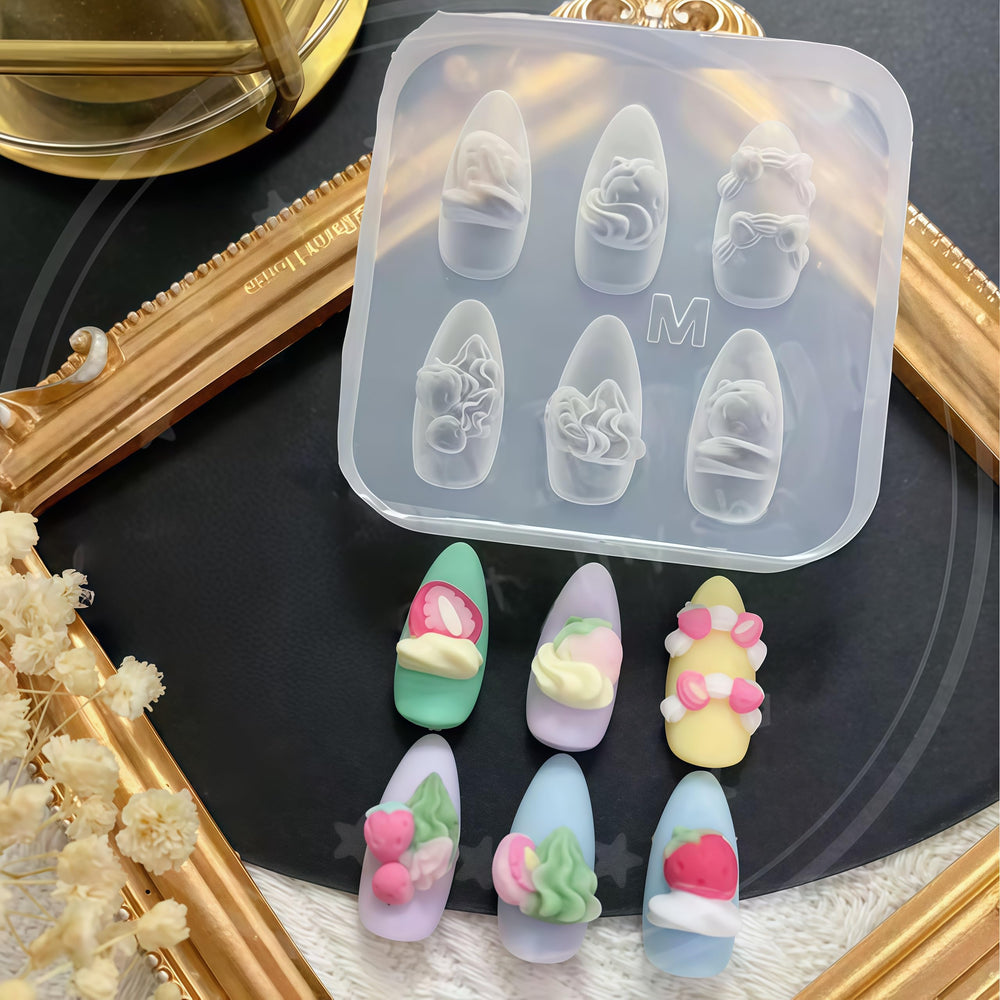 BHCCXZ molds beside a fingernail showing scale and precision fit
