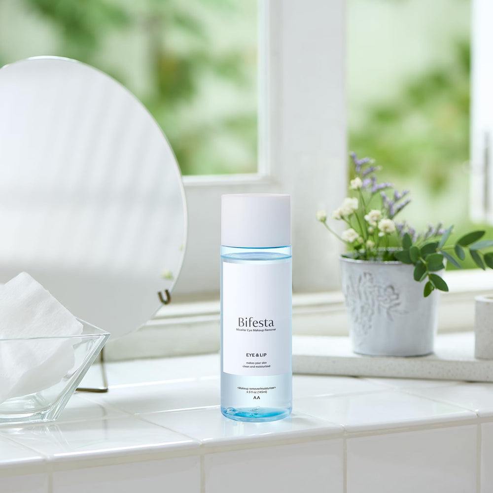Bifesta bottle in hand to show 145ml scale and travel-friendly size