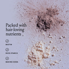 hand applying Billie Floof powder to fingertips for targeted oil absorption