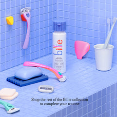 Billie Floof on bathroom counter in lifestyle scene for quick morning touchups