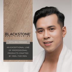 Blackstone pomade scooped on hand demonstrating easy spreadability benefit
