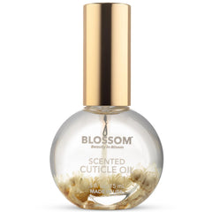 Blossom coconut cuticle oil front bottle showing floral infusion and appeal