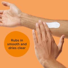 Hand holding the 3.0 fl oz Blue Lizard bottle demonstrating compact travel-friendly size