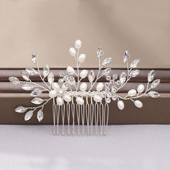 Bmirth comb held in hand to show true size and easy portability