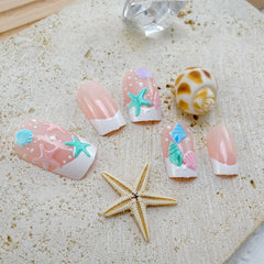 BMKKOT full set laid out with 24 nails, jelly stickers, file and wooden stick for easy at-home manicure