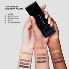 Bobbi Brown applying a metallic shade to eyelid for luminous evening look