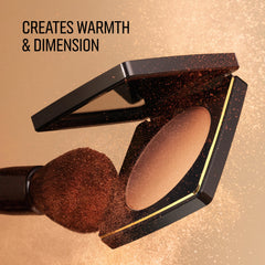 Bobbi Brown bronzing powder being applied with brush for easy buildability benefit