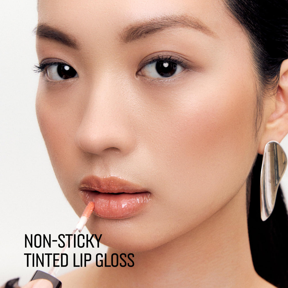Bobbi Brown gloss close-up texture highlighting hydrating oil finish and cushiony feel