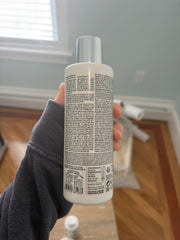 BOLD UNIQ recycled plastic symbol on bottle, signals environmentally responsible packaging