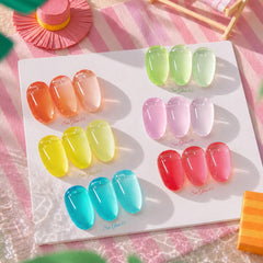 Born Pretty swatches fanned on tips showing layered translucence for creative looks