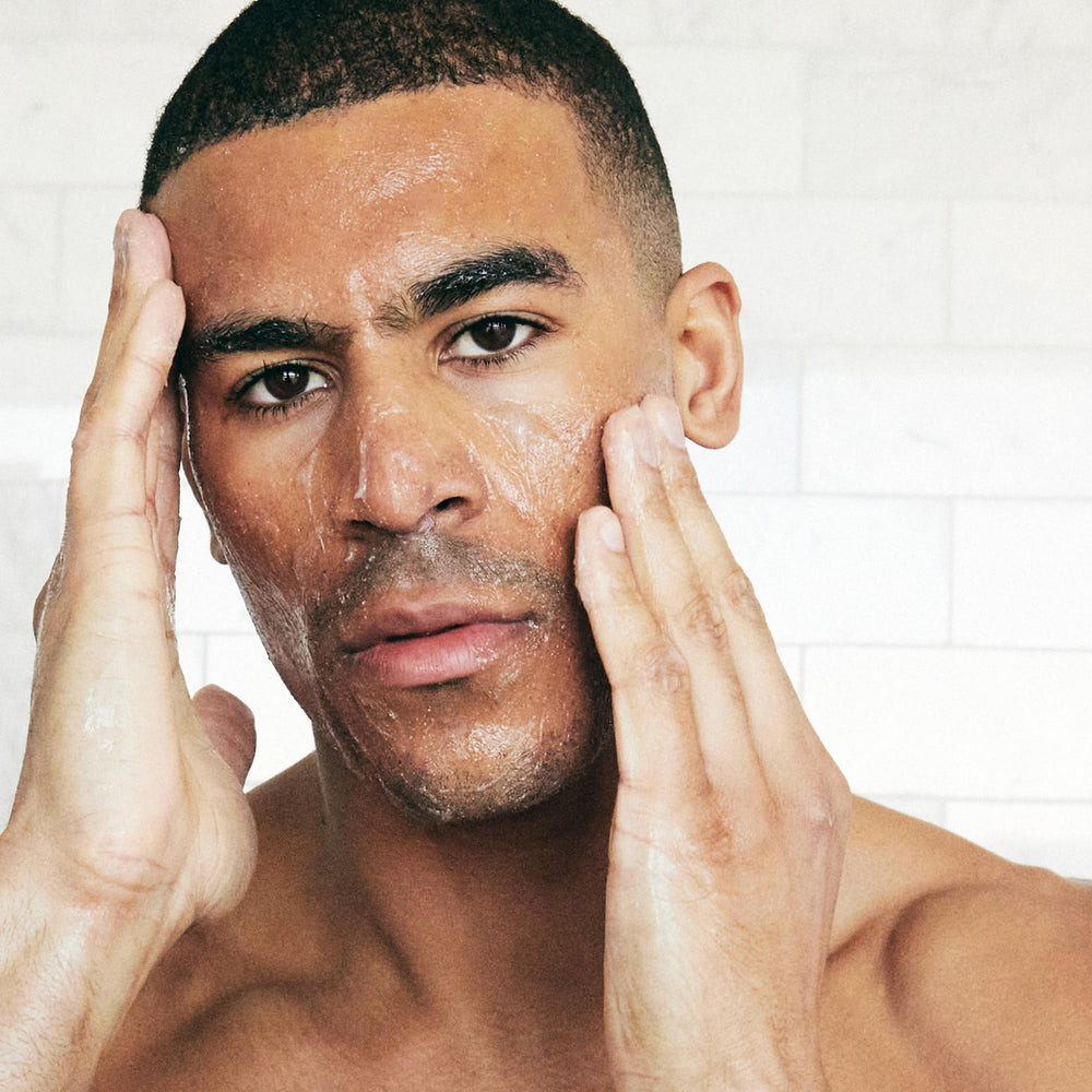 Brickell Men's Products on bathroom shelf staged for daily grooming routine