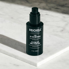 Brickell Men's Products next to common travel items showing 1.7 oz scale