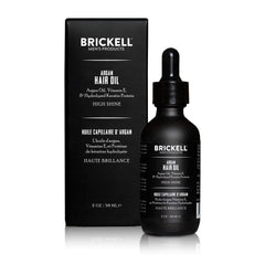 Brickell Men's Product dropper dispensing oil to control amount for styling