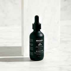 Brickell Men's Product applied in hand ready for even hair distribution
