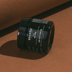 Brickell Men's Products on bathroom shelf in grooming routine inspiring consistent use