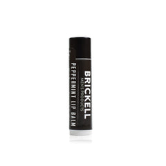 Brickell Men's lip balm front tube showing label and matte finish benefit