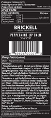 Brickell Men's lip balm in a pocket demonstrating portable protection on the go