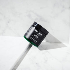 Brickell product in hand demonstrating easy application and travel-friendly convenience