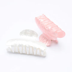 brinie front view pink and white clips showing compact design and everyday appeal