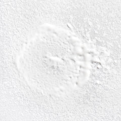 Briogeo spray nozzle close-up demonstrating easy mist application and control