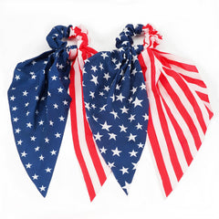 Briutn front view of two red white blue scrunchies for festive styling