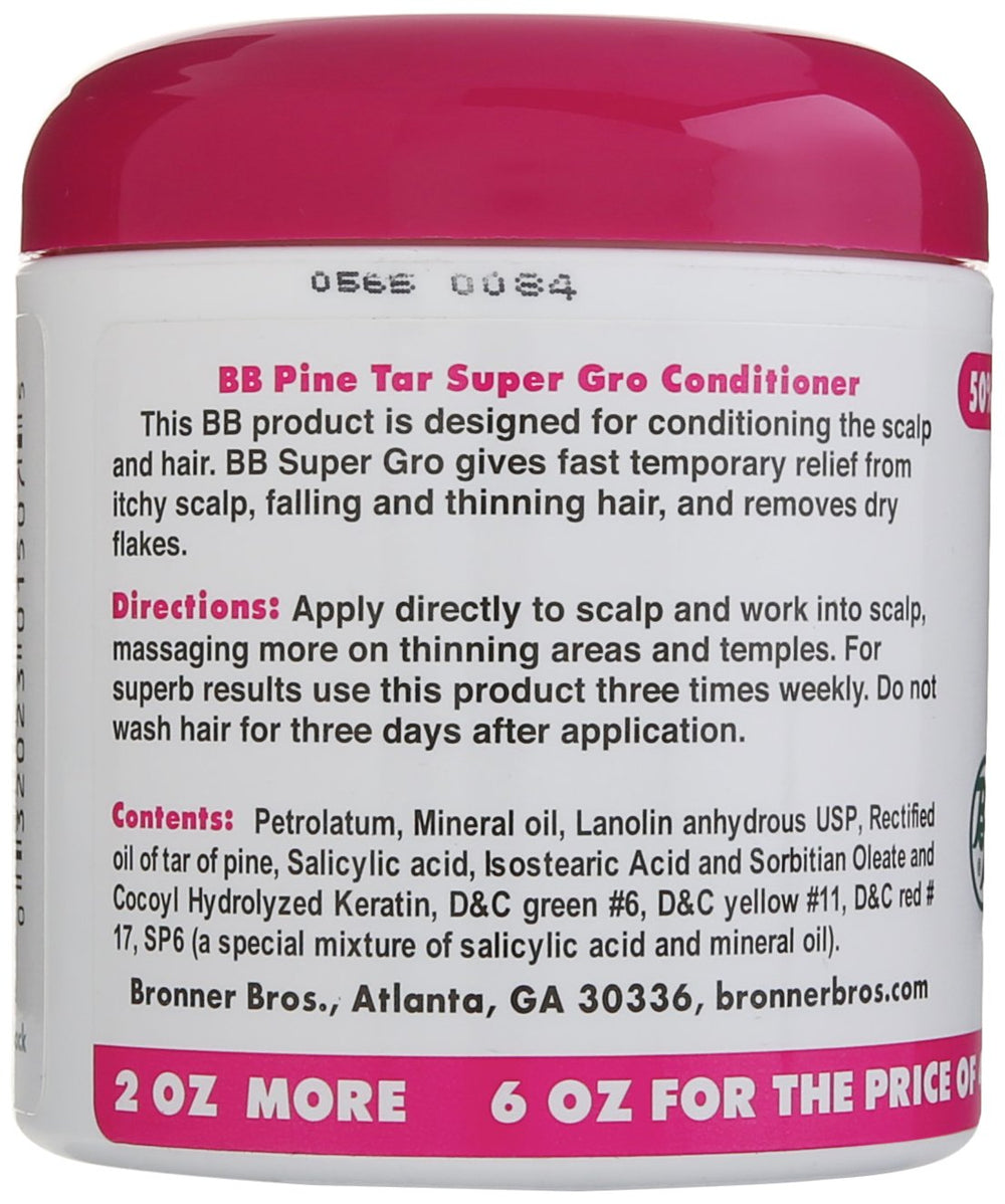 Bronner Bros applying product to scalp demonstrating targeted relief