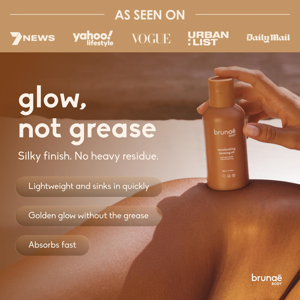 brunae body bottle next to hand showing product size and travel convenience