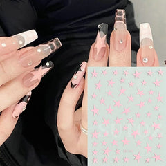 BSBTBZ finished manicure with star decals providing polished decorative accent