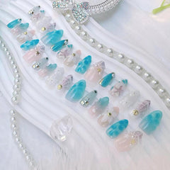 BSBTBZ nails worn on hand at beach for vacation-ready polished look