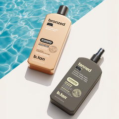 B.TAN bottle on beach towel showcasing outdoor tanning lifestyle benefit