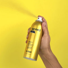 B.TAN close-up texture of spray illustrating smooth finish