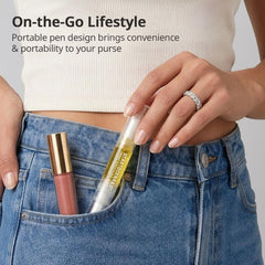 BTARTBOXNAILS pen next to hand for scale showing travel-friendly compact size