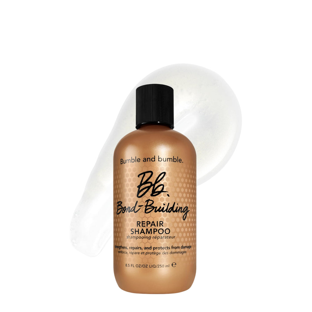 Bumble and bumble front bottle view showing restorative shampoo and benefits