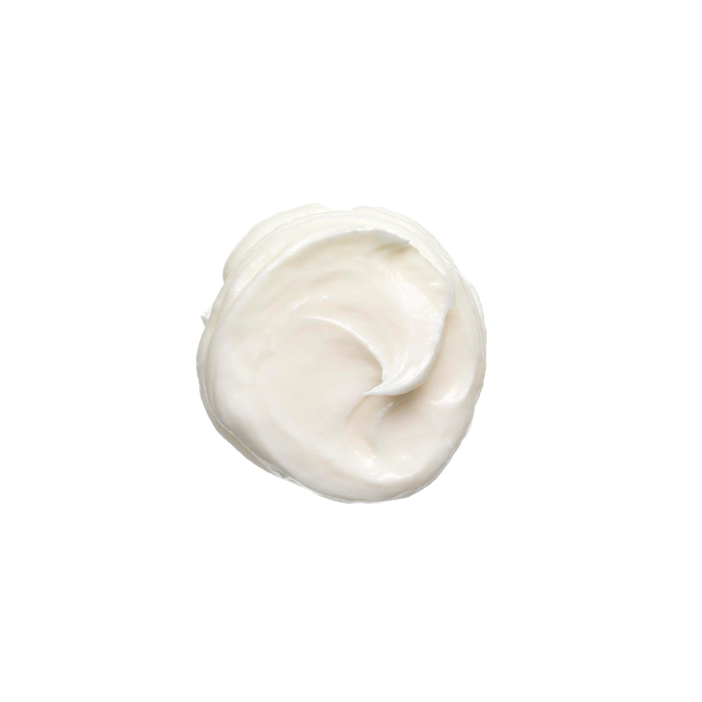 Bumble and bumble being applied to damp hair for air-dried styling