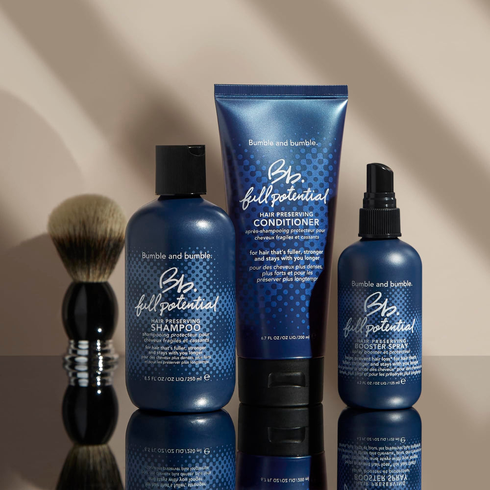 Bumble and bumble size comparison in hand showing 6.7 fl oz for convenience and travel
