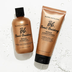 Bumble and bumble next to a hand for scale and travel-friendly size benefit