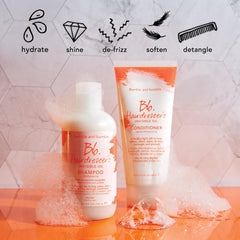 Bumble and bumble bottle in hand to show travel 2 fl oz scale and convenience