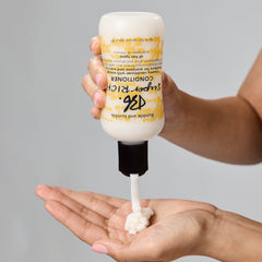 Bumble and bumble dispensing conditioner demonstrating easy application