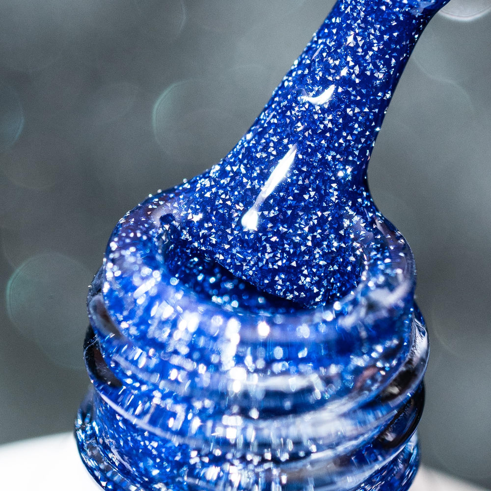 BURANO royal blue bottle front view showing holographic glitter and premium finish