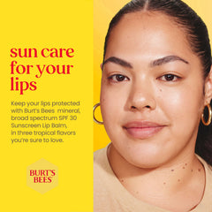Burt's Bees lip balm on beach towel illustrating water-resistant sun care benefit