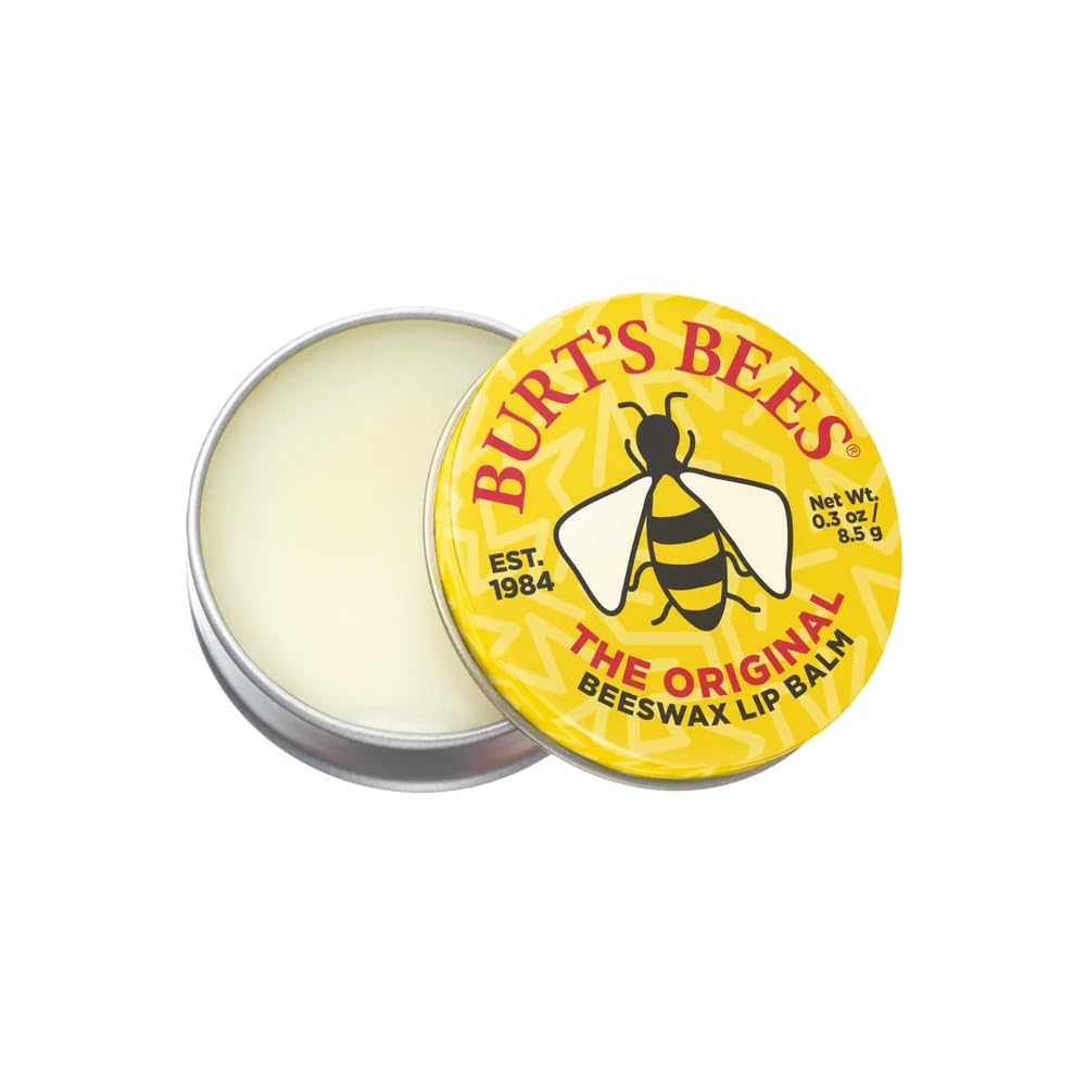 Burt's Bees tin on a desk lifestyle scene showing quick access and natural care for dry lips