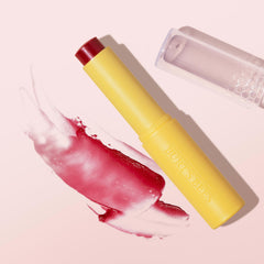 Burt's Bees in a purse scene showing convenience and quick touch-up readiness