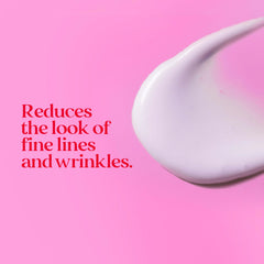 Burt's Bees applying serum to fingertip for targeted spot treatment