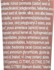 Burt's Bees closeup on lips showing natural plum tint and hydrated look
